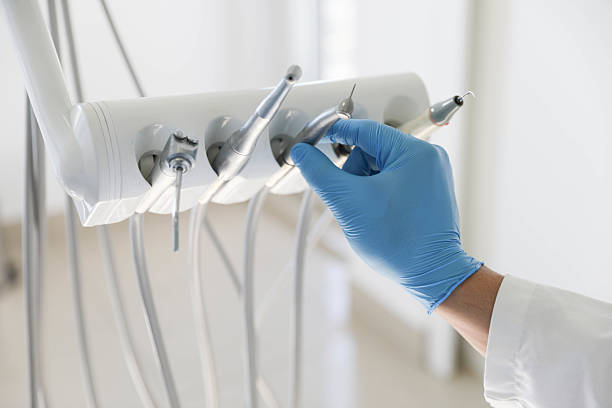 Professional Tooth Extraction technician working in Irvington, KY